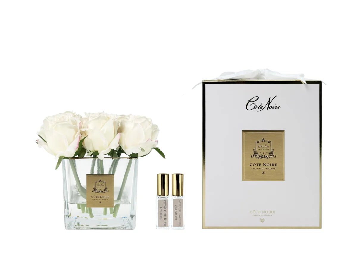 موزّع عطر 9 وردات BLUSH في وعاء شفاف