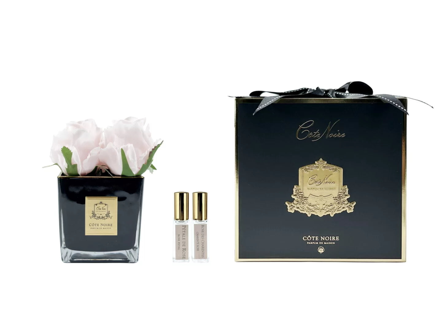 موزّع عطر 4 وردات وردية في وعاء أسود